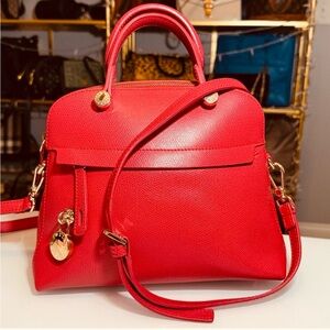 Like New Furla Red Leather 2-way Bag with Gold Charm. Zippered outside storage.